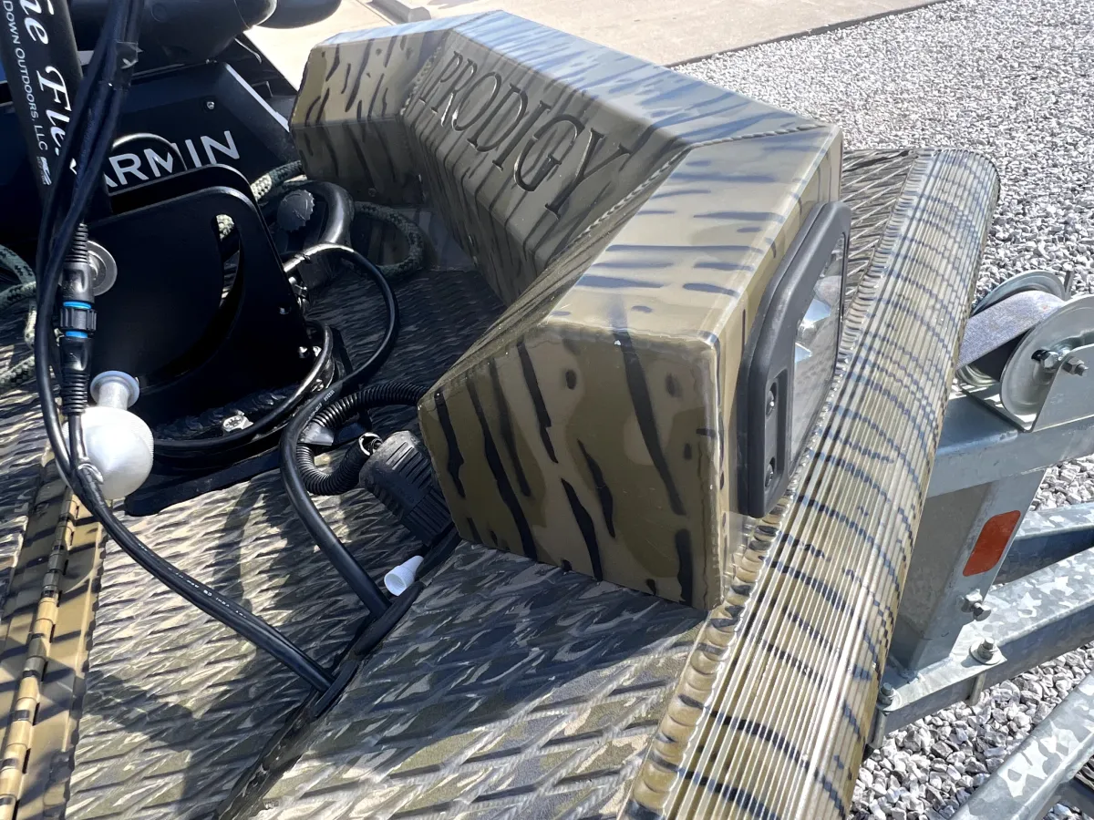 Close-up of the polished stainless steel propeller and lower hull near stern of the 2023 Prodigy Villain 1751, emphasizing maintenance condition at Waypoint Marine